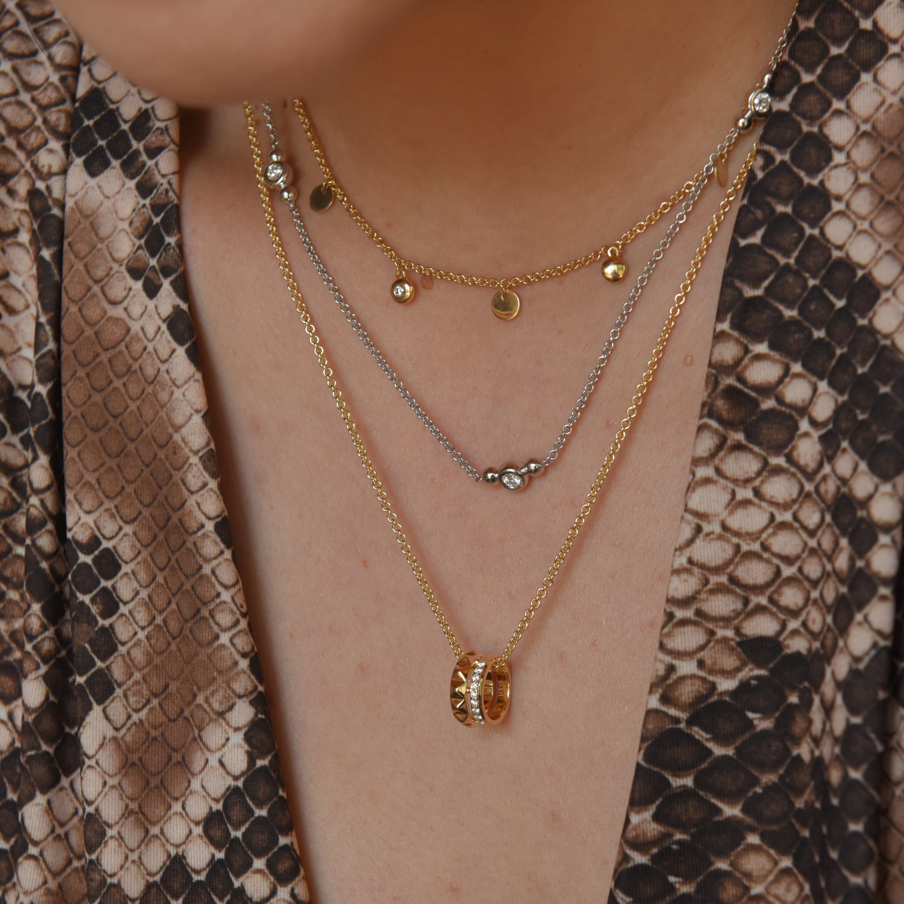 Modern Electrum Jewelry. Fluorescent diamond necklace and natural diamond pendant. Diamonds that glow on adjustable chain from Ekati and Gahcho Kué.