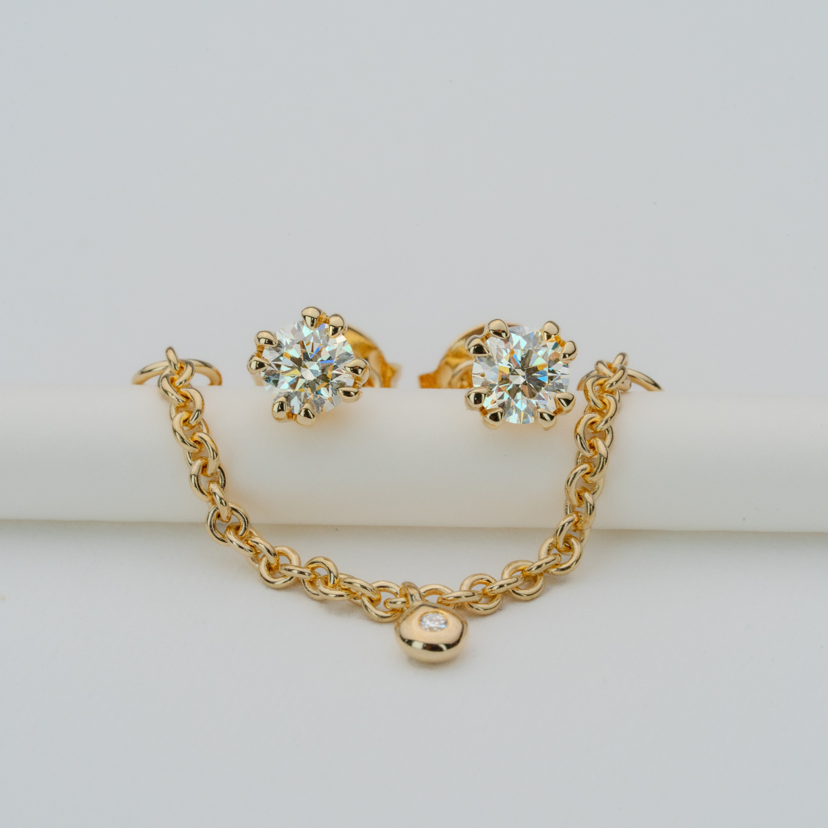 Gold Earth earrings peak Stud earrings with removable chain jacket. 4 natural Canadian diamonds set in Modern Electrum™ from Ekati.