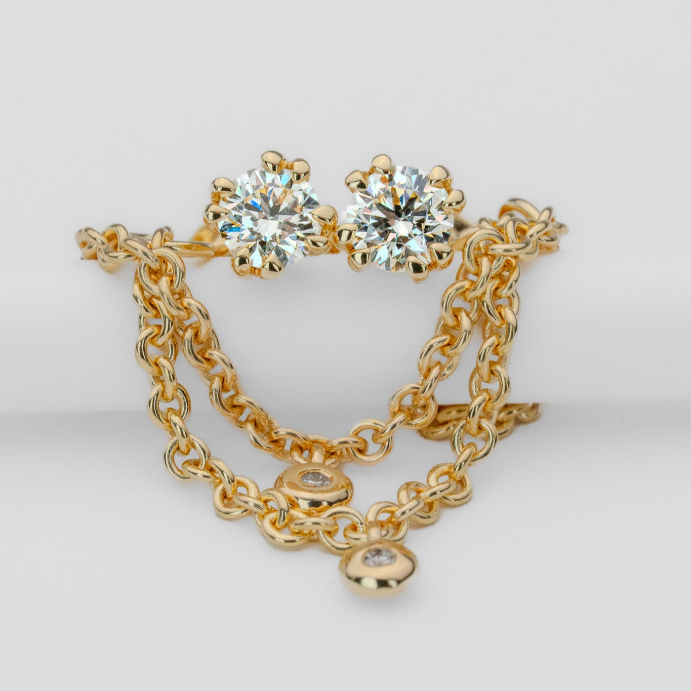 Gold Earth earrings peak Stud earrings with removable chain jacket. 4 natural Canadian diamonds set in Modern Electrum™ from Ekati.