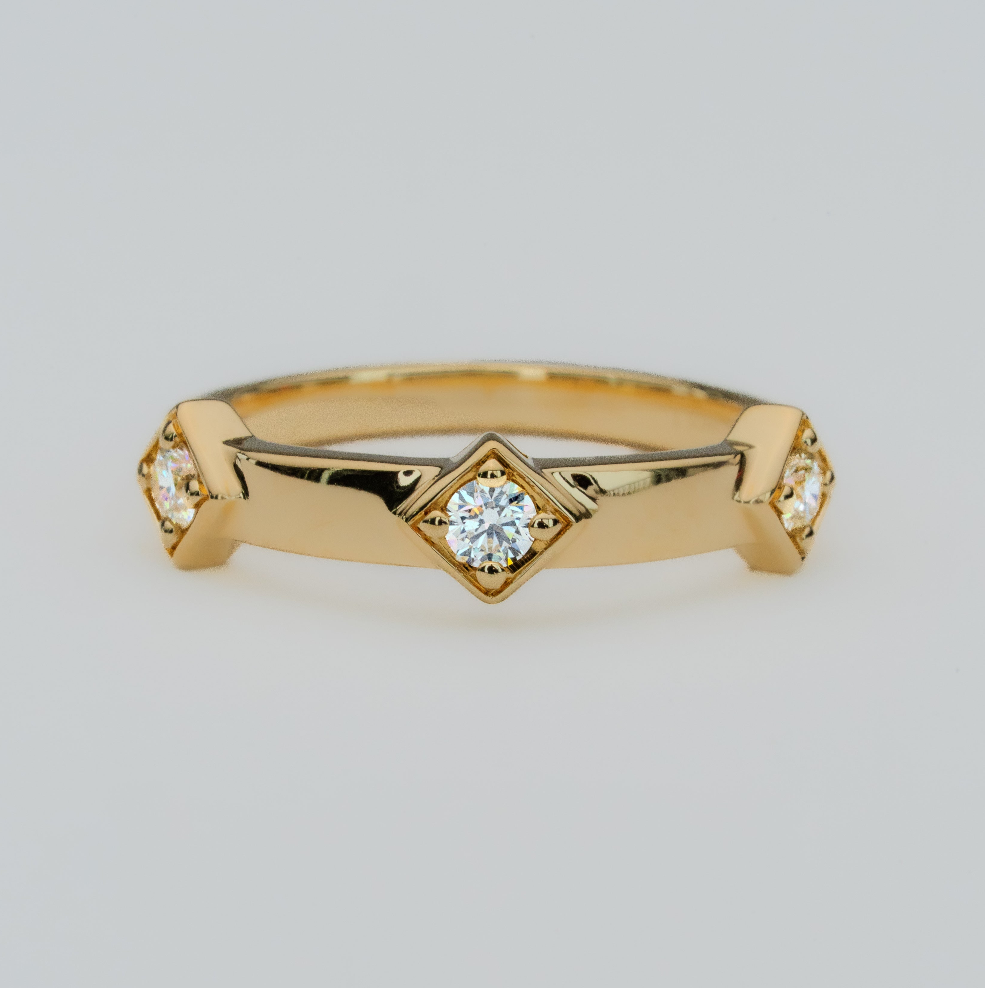 Gold Earth Ring Peak III with round-cut natural Canadian diamonds in a crown design set in Modern Electrum™ from Ekati