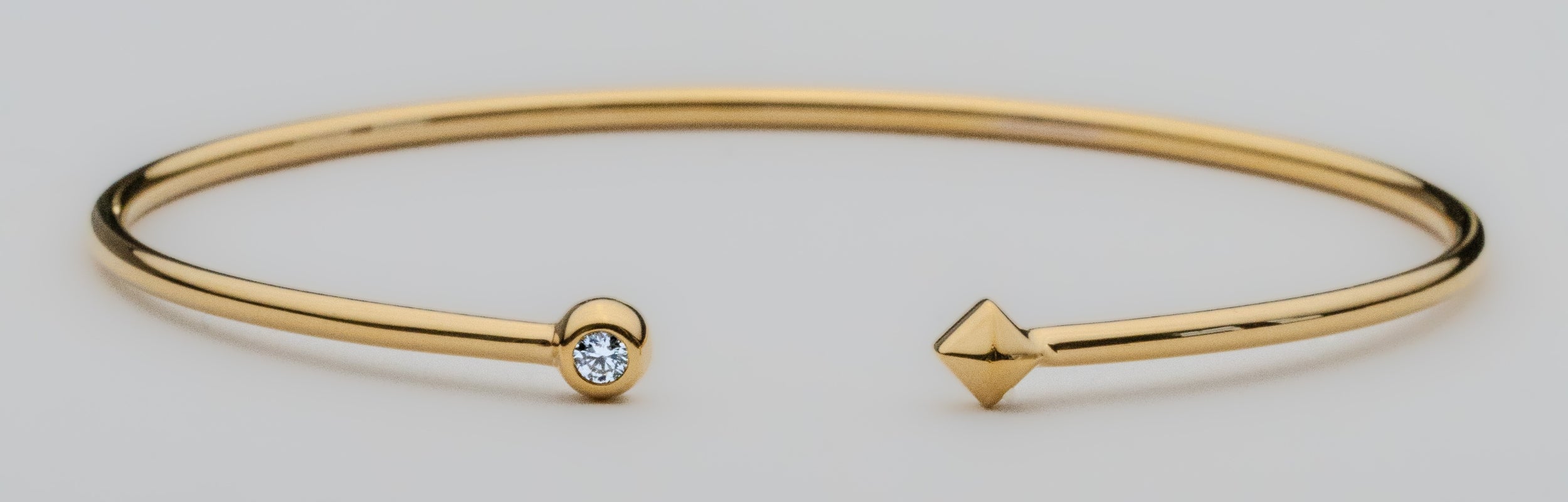 Unisex Earth Bracelet Origin stylish flex bangle with Ekati Canadian natural diamonds in gold Modern Electrum