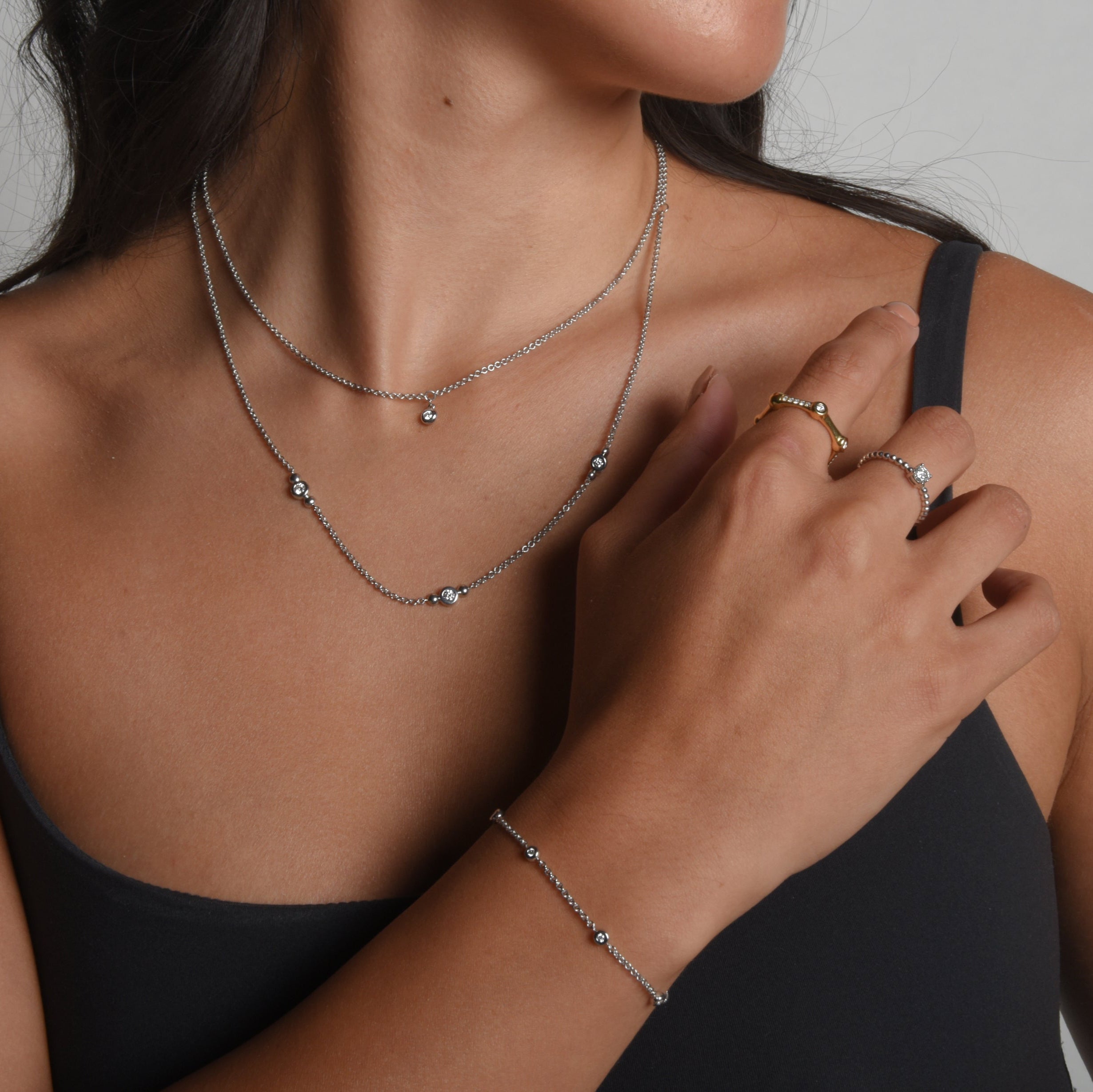 Modern Electrum fluorescent diamond jewelry from LANDS spirit collection. Natural diamond rings, bracelets and necklaces.