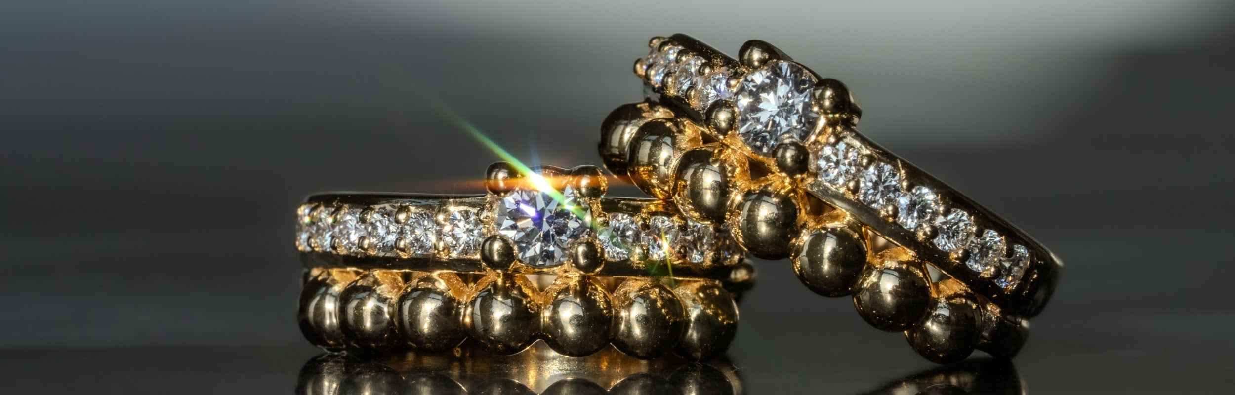 Unisex LANDS Spirit Earrings Peak Natural Canadian Diamond Earrings hoop set in Modern Electrum with Diamonds That Glow.