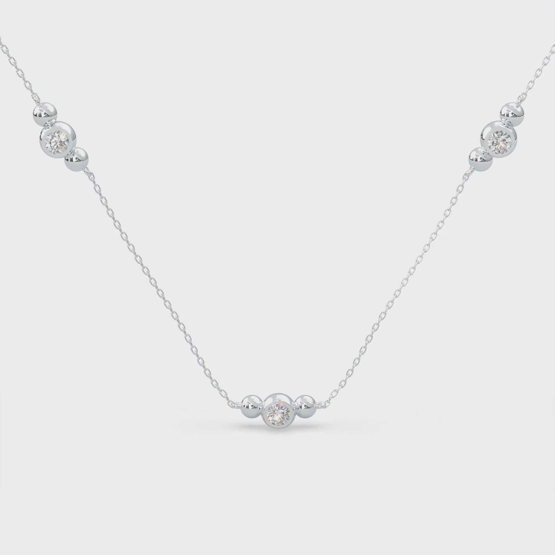 White Modern Electrum Jewelry. Three-stone fluorescent diamond necklace. Round diamonds that glow on an adjustable 1.8mm chain.