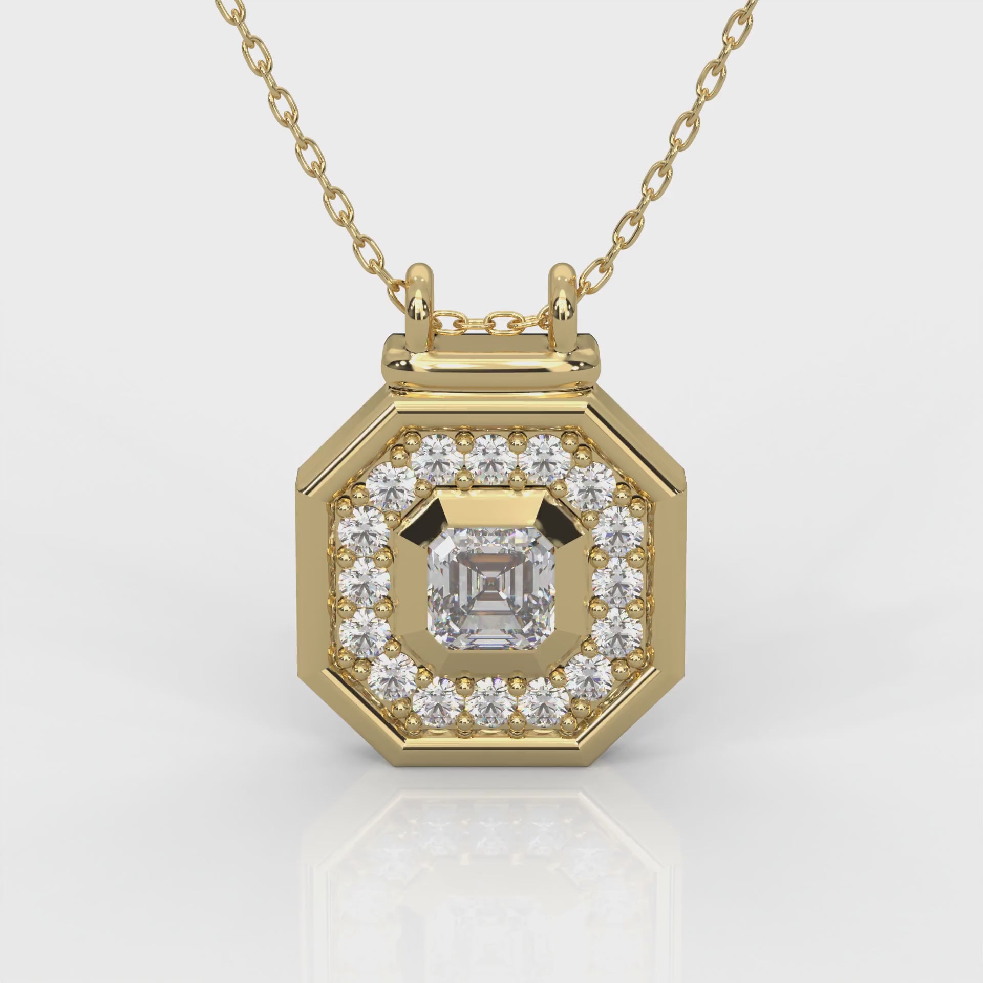 One square emerald and sixteen round-cut natural Canadian diamonds. 0.38 carat total weight. 20, 18, 16 inch adjustable 1.8mm chain set in Modern Electrum™. Color range from K to Z, with a clarity of SI and above. Ekati mine earth collection 45 to 55 million years old.