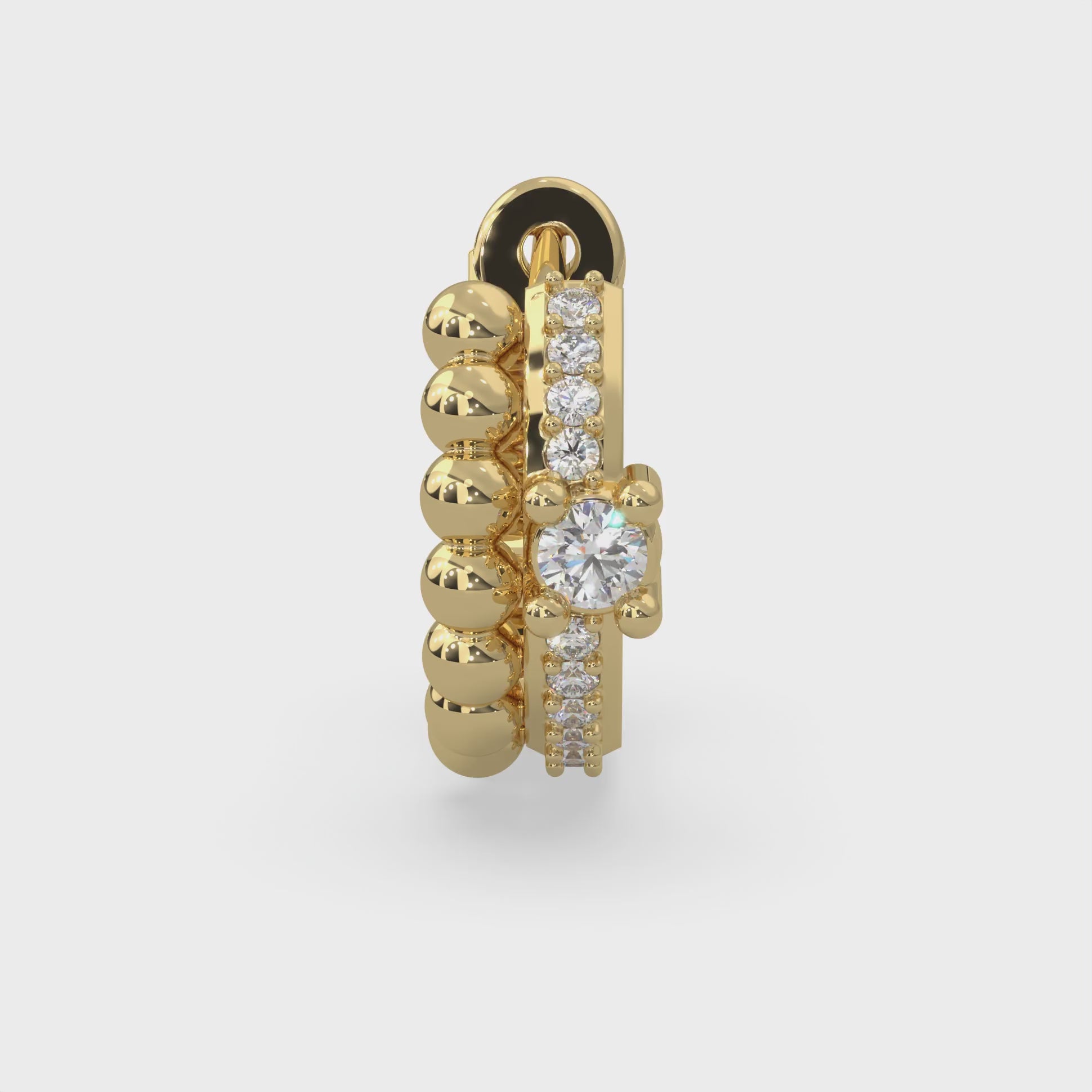 22 round-cut type 2a glowing natural Canadian diamonds. 0.36 carat total weight. Double hoop style set in Modern Electrum™. D to H in color and SI clarity and above. Gahcho Kué spirit collection 500 million years old. 