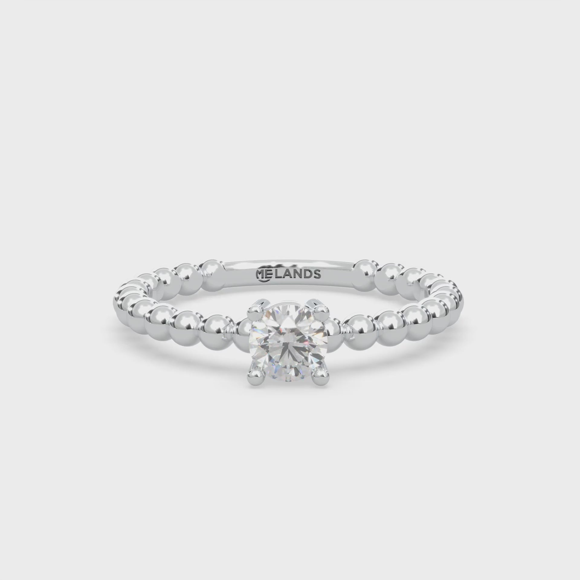 1 round-cut type 2a glowing natural Canadian Gahcho Kué diamond. 0.29 carat total weight. Solitaire design set in Modern Electrum™. D to H in color and SI clarity and above. spirit collection 500 million years old. Diamonds that glow in the dark.