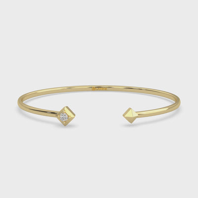 unisex Flex bangle diamond bracelet. One round cut diamond set in Modern Electrum™ from Ekati.