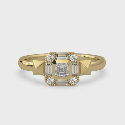 Natural Canadian diamonds. Four round and four baguette and one square emerald. 0.37 carat total weight set in Modern Electrum™. Color range from K to Z, with a clarity of SI and above. Ekati mine earth collection 45 to 55 million years old.