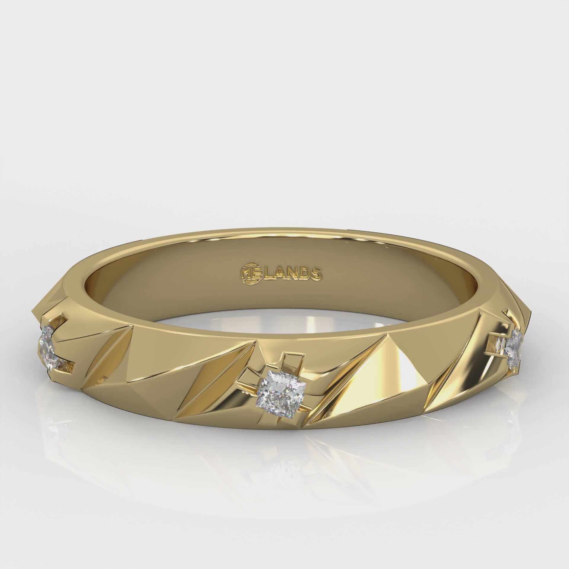 Three round-cut natural Canadian diamonds. 0.10 carat total weight set in Modern Electrum™. Color range from K to Z, with a clarity of SI and above. Ekati mine earth collection 45 to 55 million years old.