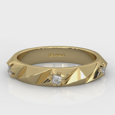 Three round-cut natural Canadian diamonds. 0.10 carat total weight set in Modern Electrum™. Color range from K to Z, with a clarity of SI and above. Ekati mine earth collection 45 to 55 million years old.